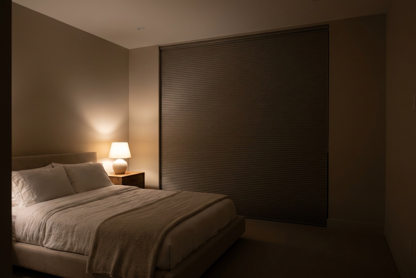 Blackout cellular shade in a dark bedroom
